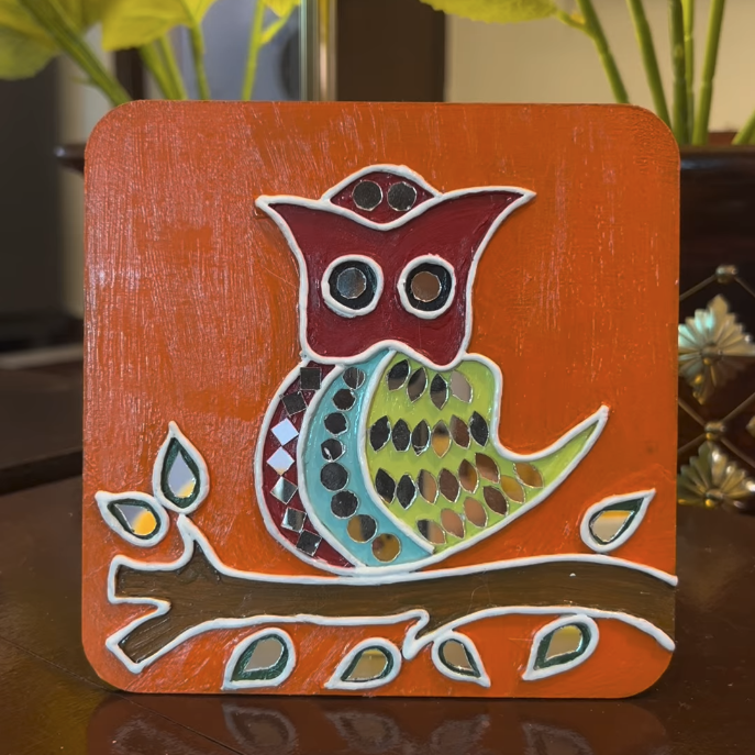 Hand-painted folk art owl on a branch